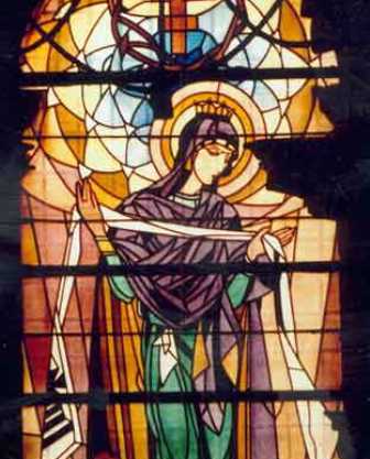 This beautiful stained glass image of the Virgin Mary was created by Ukrainian artist Petro Kholodny in 1924.