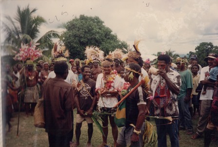 People who live in the jungle of Papua New Guinea gather together after the Catholic Mass is celebrated.