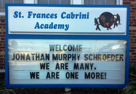 This school marquee sign for Saint Frances Cabrini Academy welcomes Jonathan Murphy Schroeder, the adopted son of Dr. Pete Schroeder, school principal.