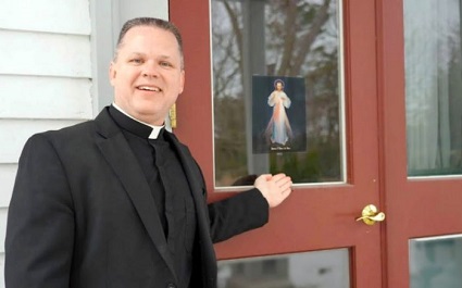 Marian Father Chris Alar encourages everyone to 